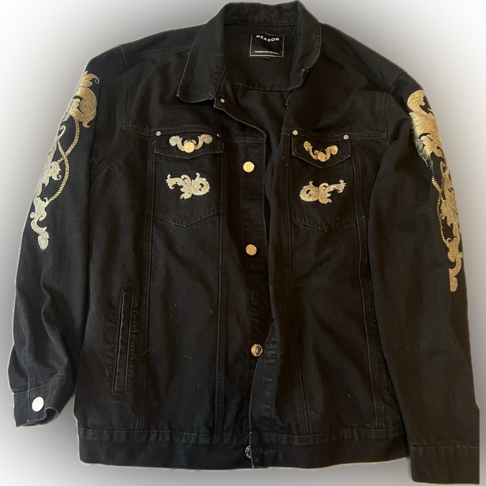 A reason brand Jean jacket with a golden design